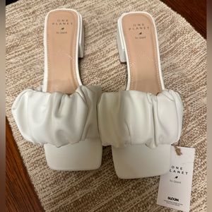 One Planet White Heels by Qupid